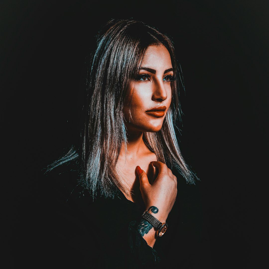 Professional headshot of female broadcast producer and trainer