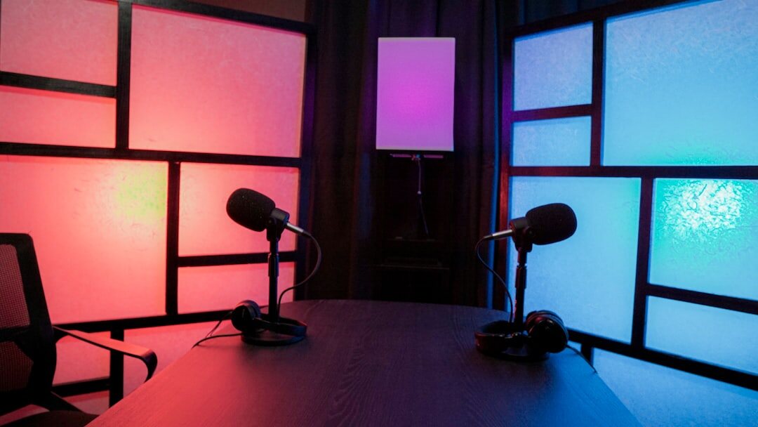 Modern TV news studio interior with multiple screens and broadcast equipment