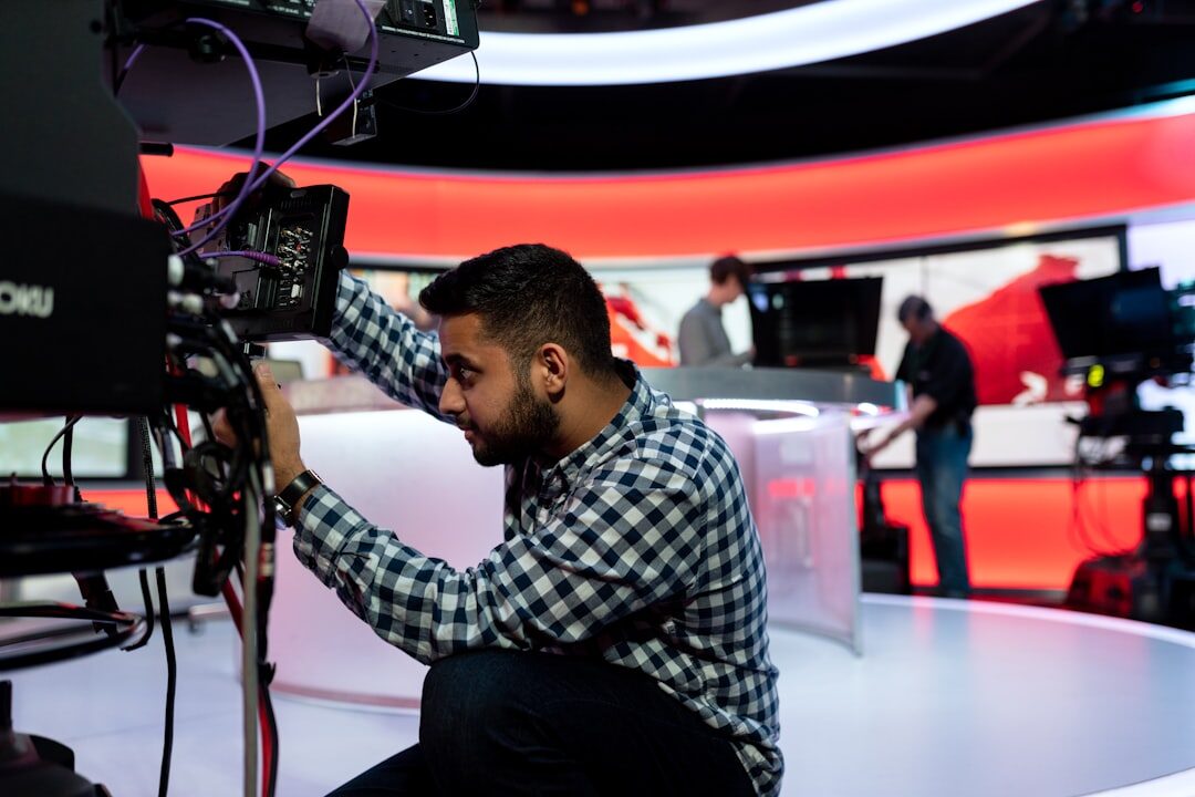 Camera on tripod set up in TV studio